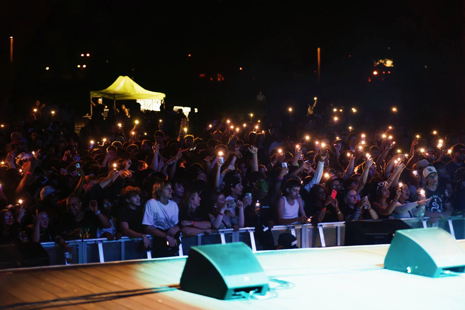 Crowd holds phone lights during Lil Yachty at Terminal B